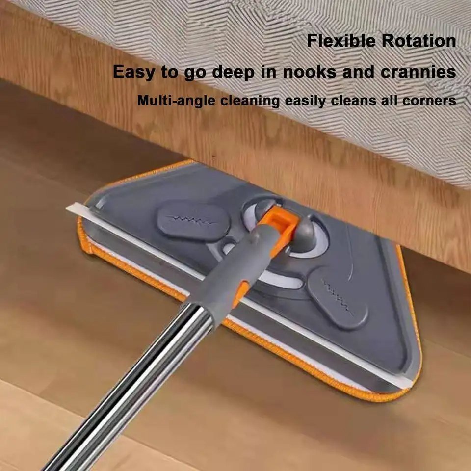 Triangle mop head on its swivel joint reaching into the gap under a sofa