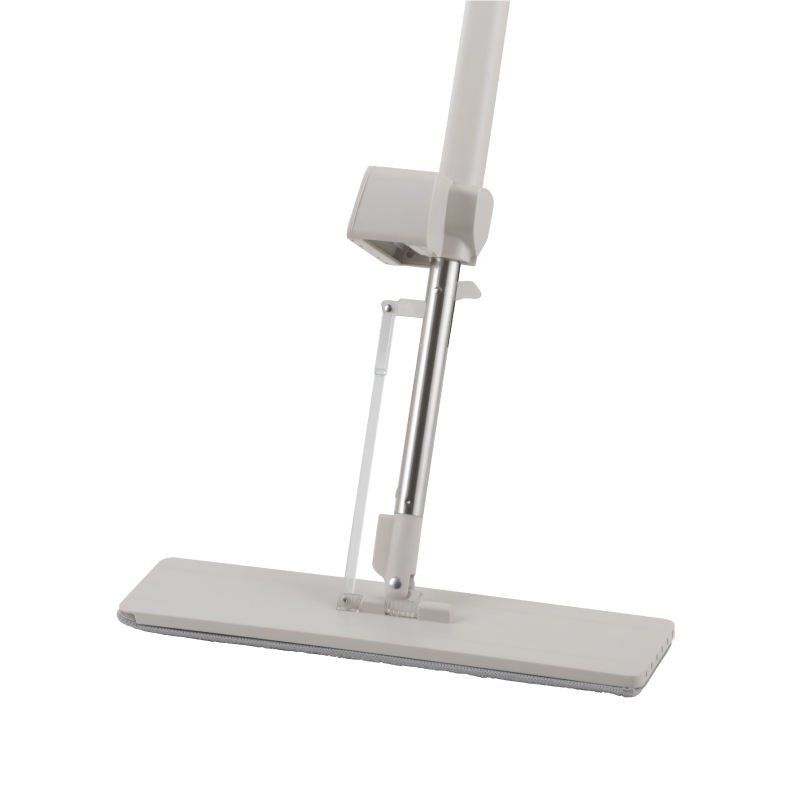 Auto-rebound flat mop head lying flat with the scraper housing raised on the pole