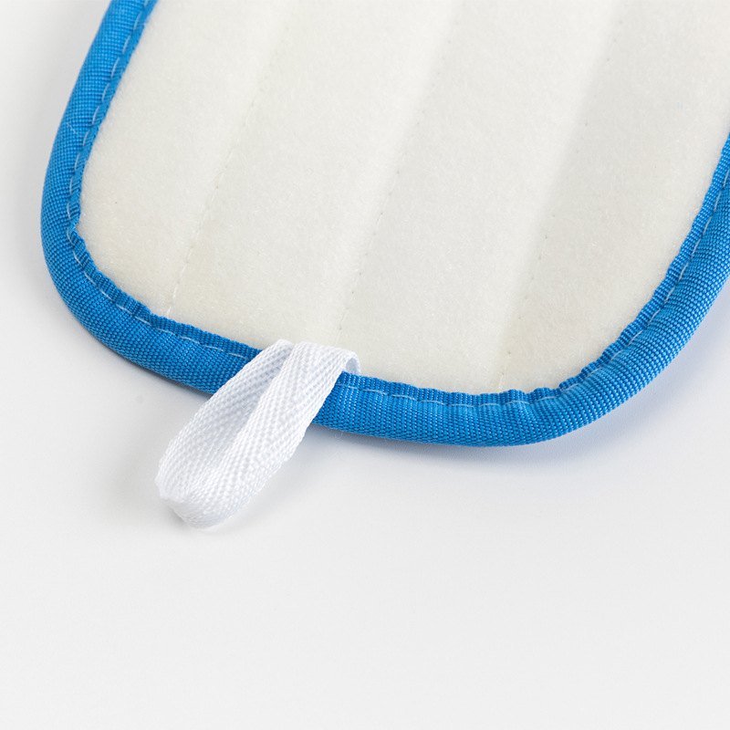White hook-and-loop back of the blue mop pad with its fabric hanging loop