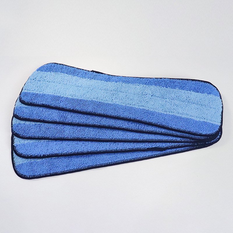 Stack of six blue-striped microfiber flat mop pads on a white table