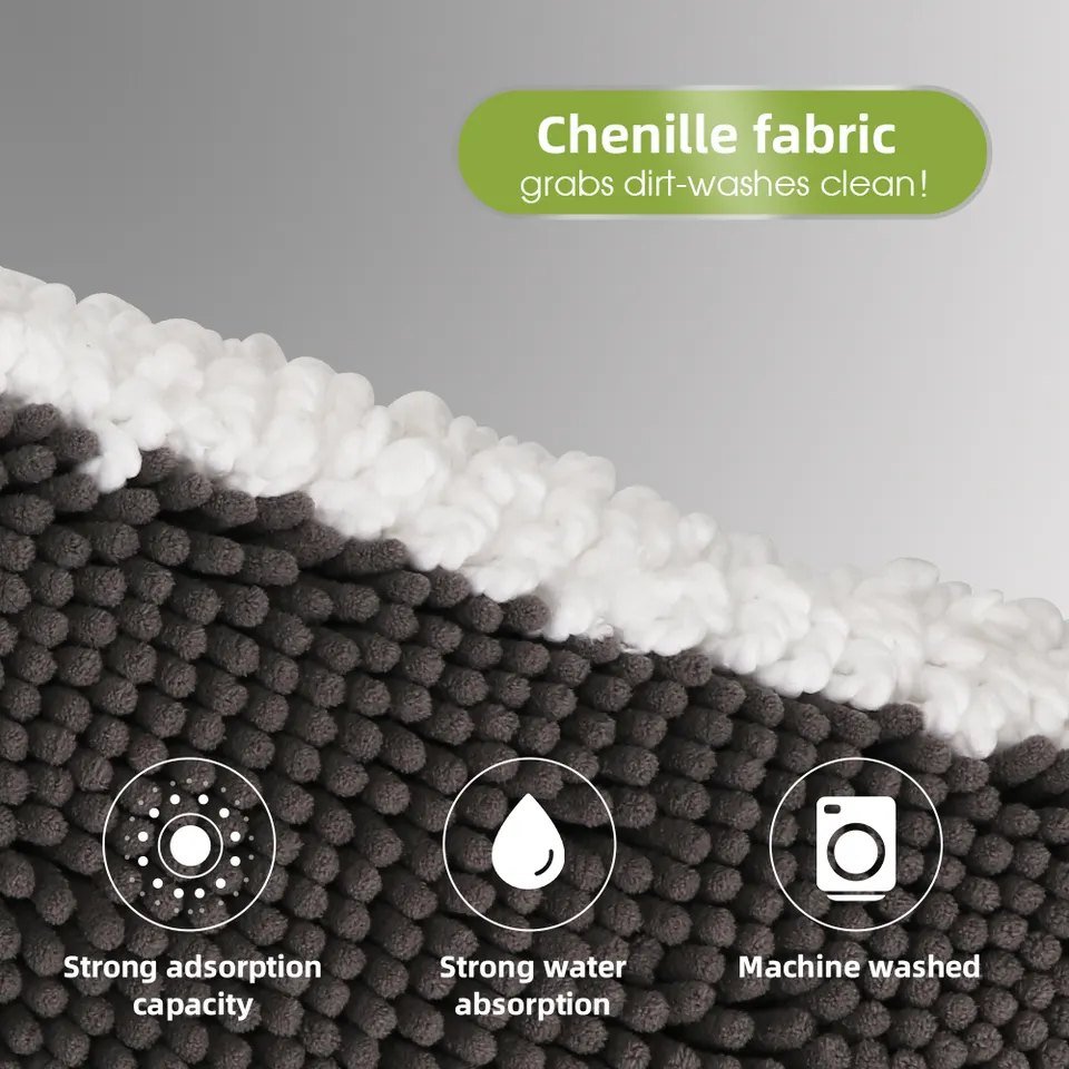Close-up of the grey chenille pad with white loop border of the flat mop