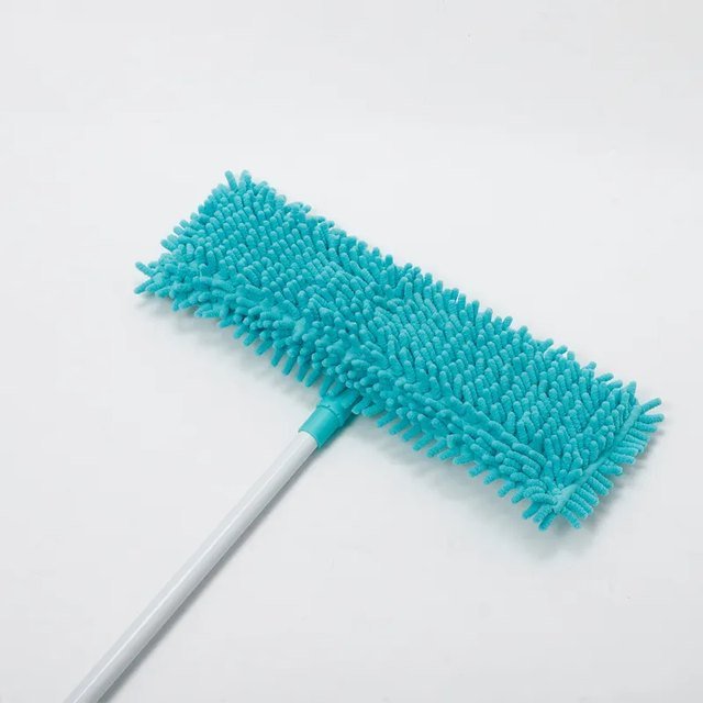 Teal chenille pad of the pocket flat mop seen from below on a white pole