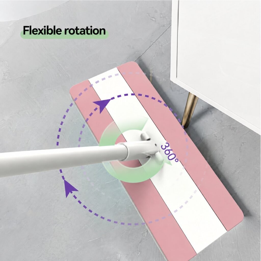 Clip-on flat mop head turning on its 360° swivel joint beside a cabinet