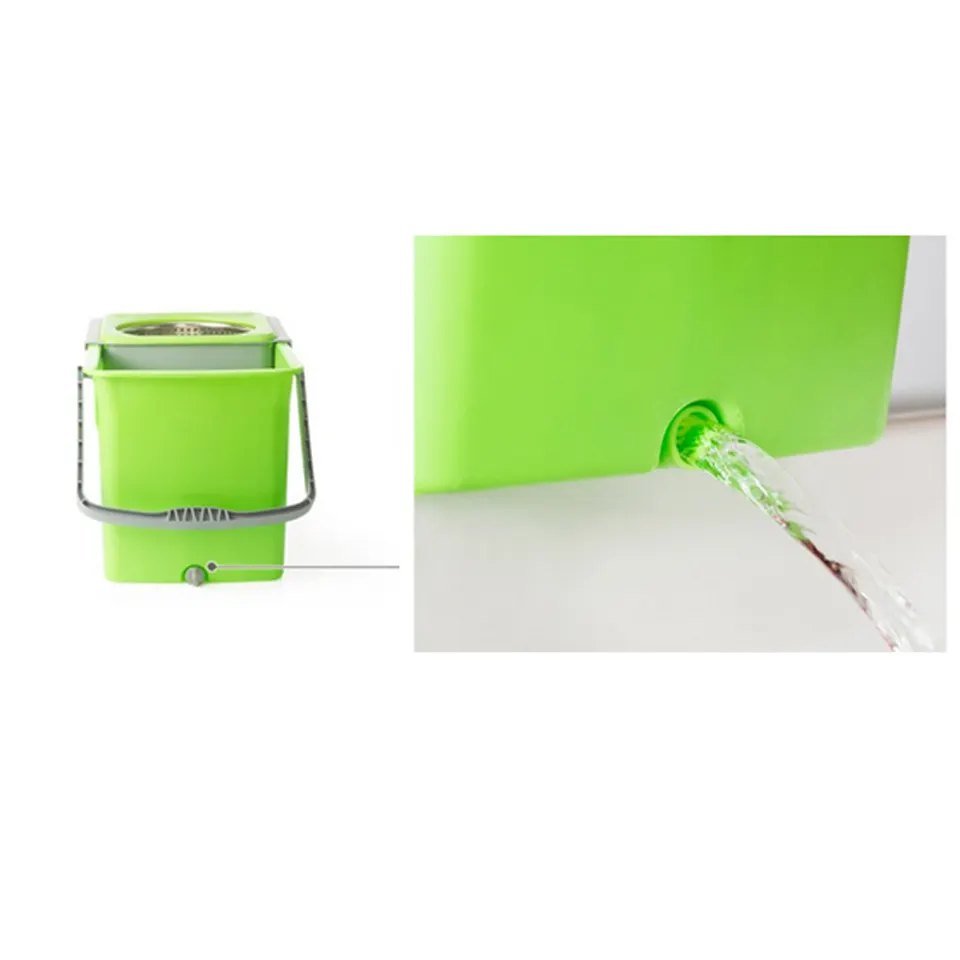 Water running out of the drain outlet on the side of the green spin mop bucket