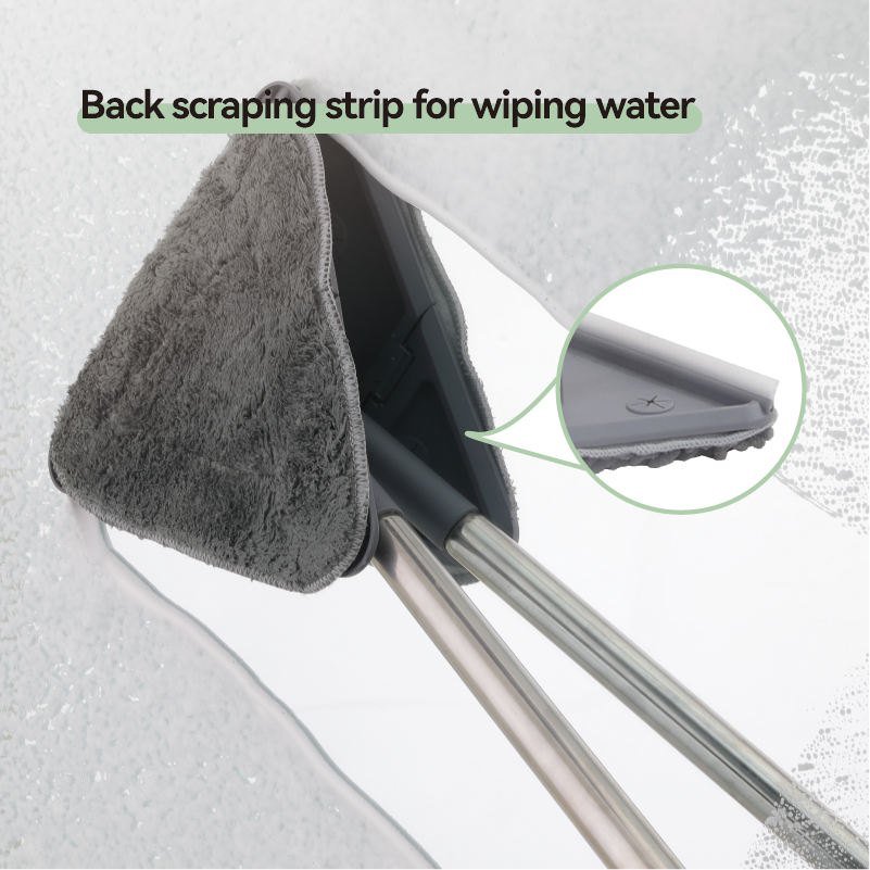 Back scraper strip of the triangle mop wiping water off a glass shower screen