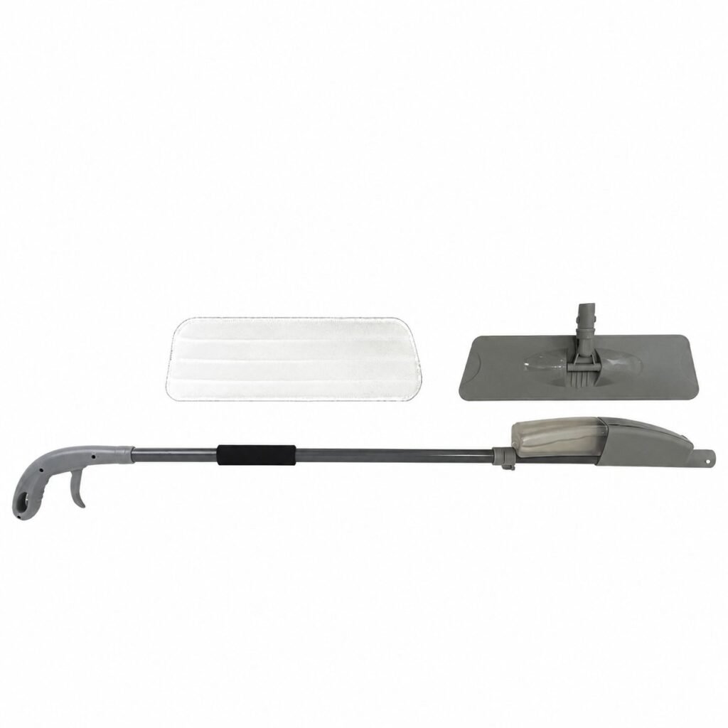 Grey spray mop parts laid out: trigger handle and pole, head plate and microfiber pad