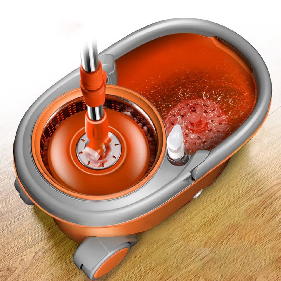 Hand-press spin mop head turning in the water of the orange bucket wash side