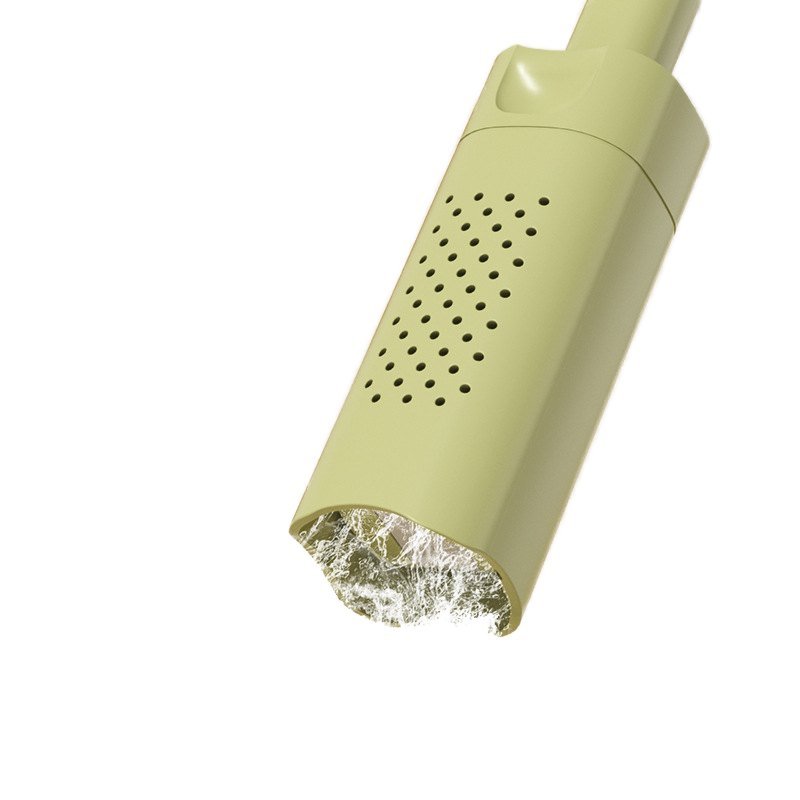 Close-up of the sponge head squeezed inside the perforated sleeve of the mini mop