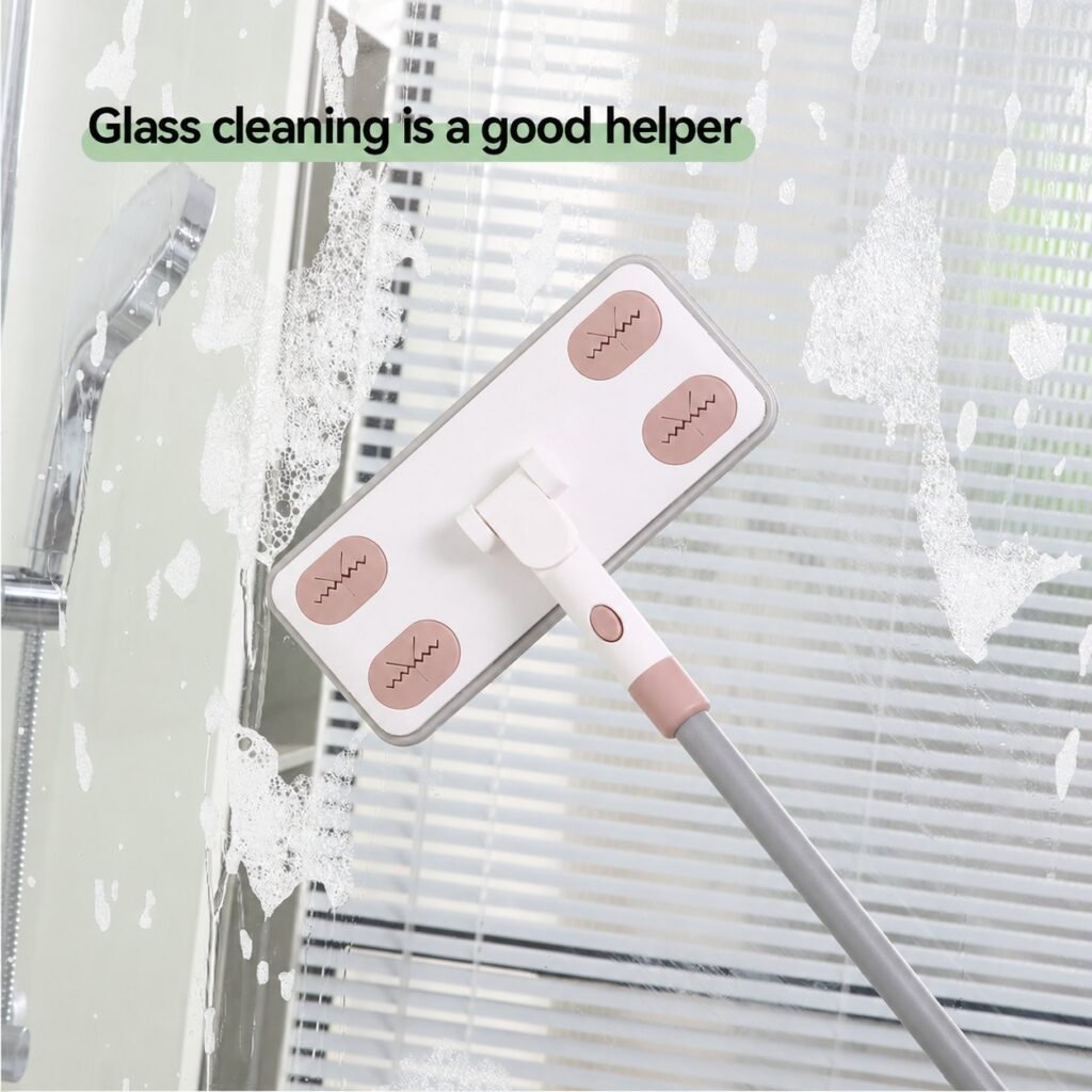 Flat mop with press-in grips used upright to clean soapy shower glass