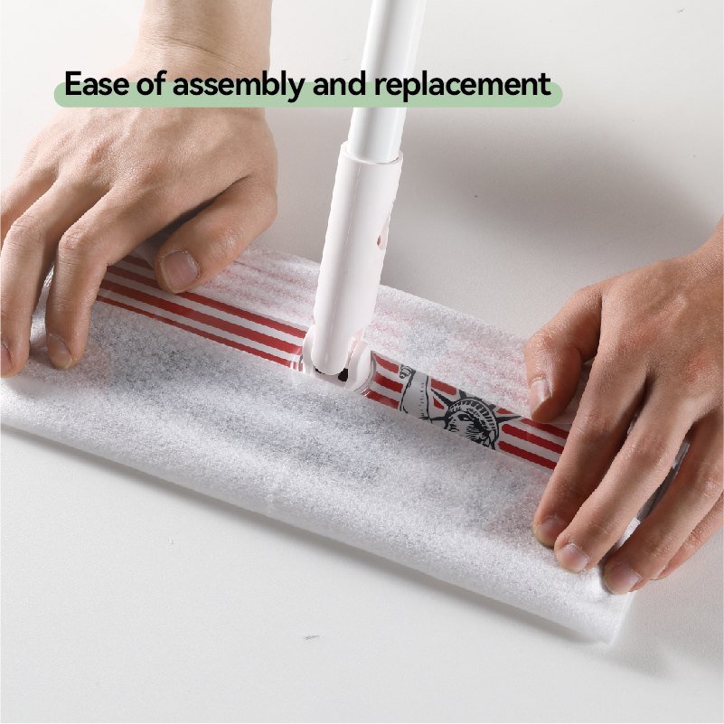 Two hands wrapping a fresh white wipe round the printed flat mop baseplate