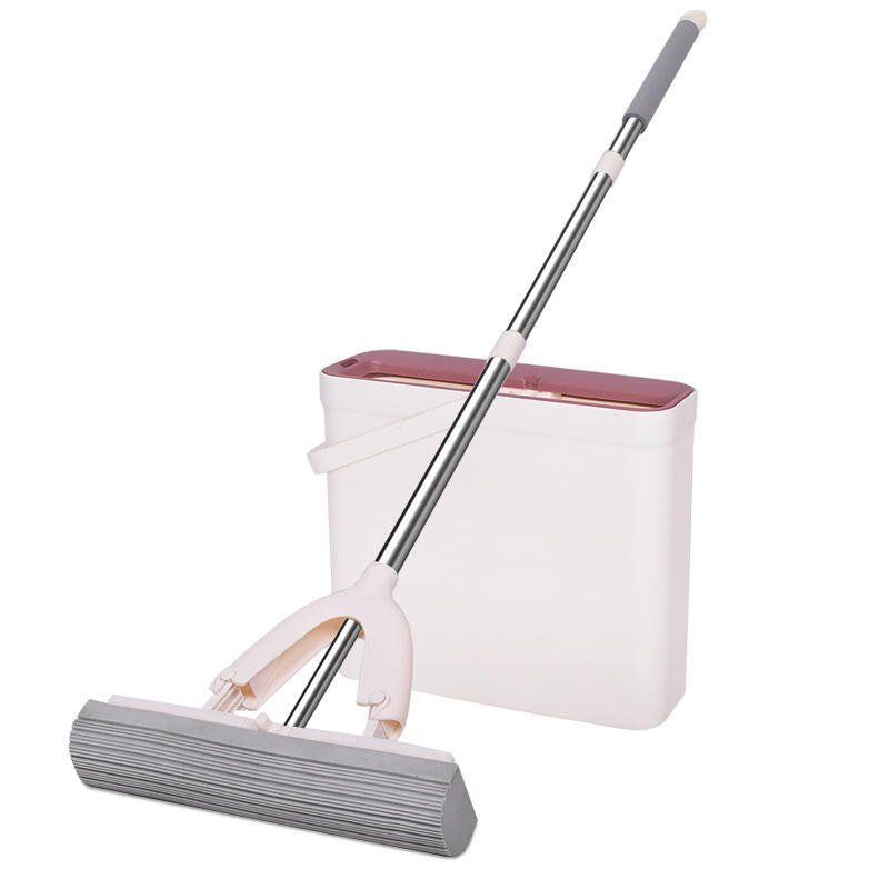 31 cm PVA sponge mop leaning against its slim cream wringing bucket