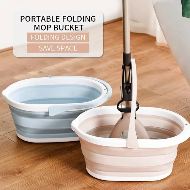 Pink folding bucket with the sponge mop inside, beside a blue folding bucket