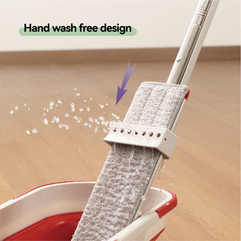 Wringer sleeve sliding down the microfiber pad over the folding bucket