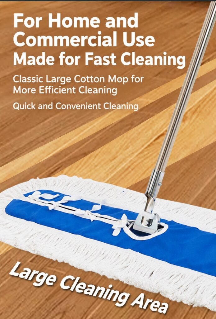 Large cotton dust mop with stainless handle on a wooden floor