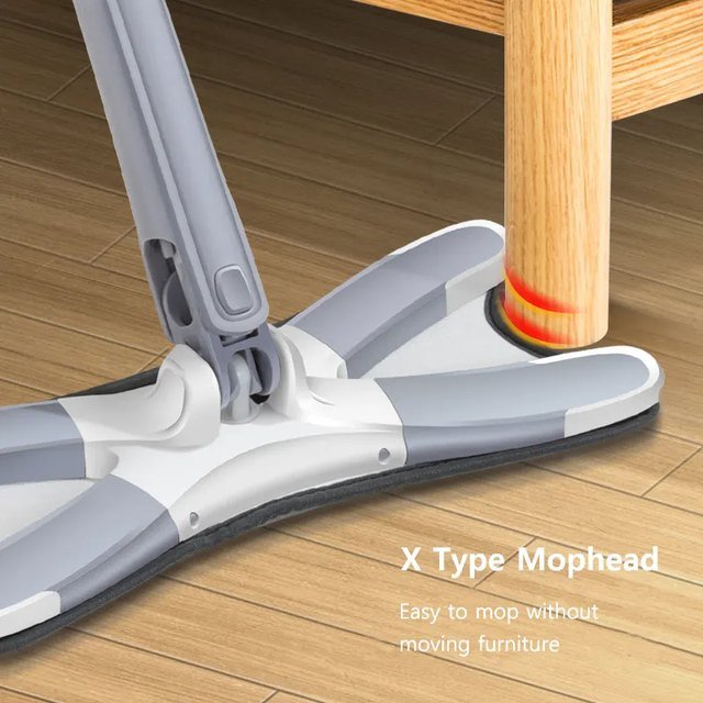 Cut-away side of the X-shaped mop head fitted round a wooden chair leg