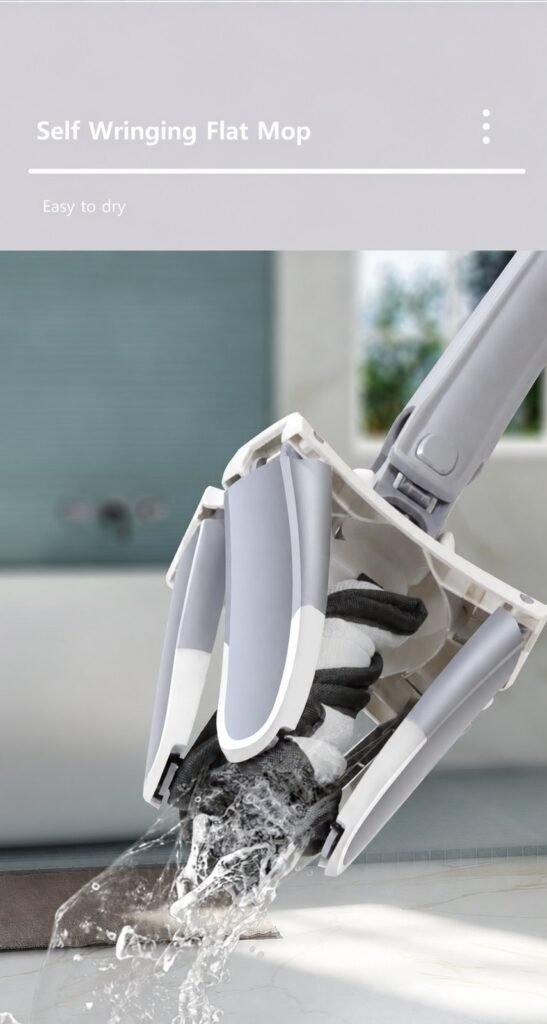 X-shaped mop arms folded round the pad, wringing water out over a bathroom floor