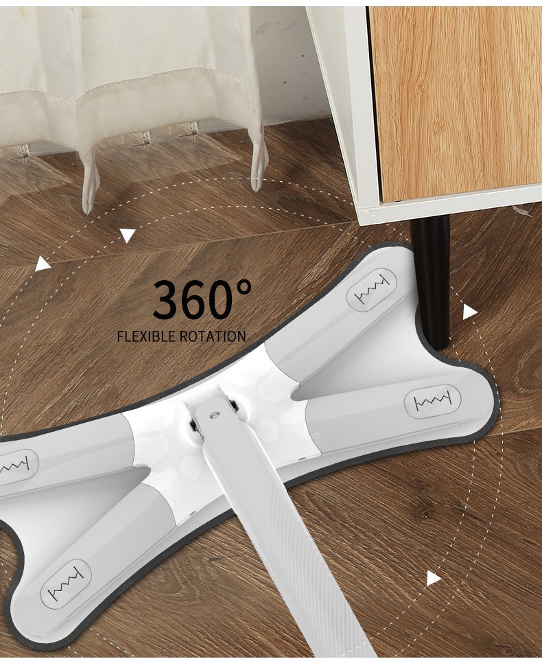 X-shaped flat mop head turning on its 360-degree swivel joint on a wooden floor